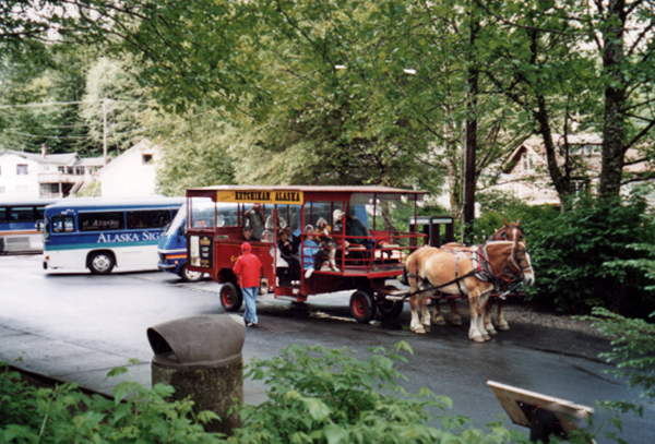 Buses and a tourist ride